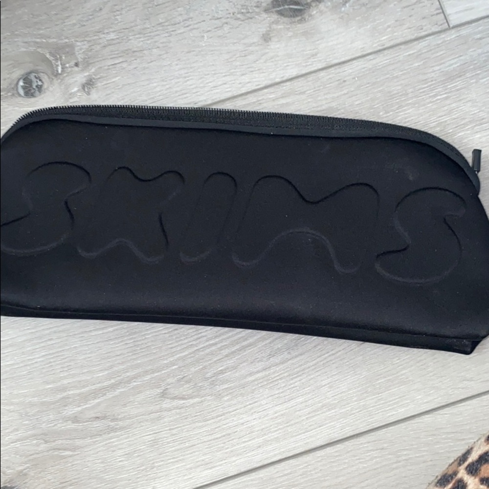 SKIMS carrying case